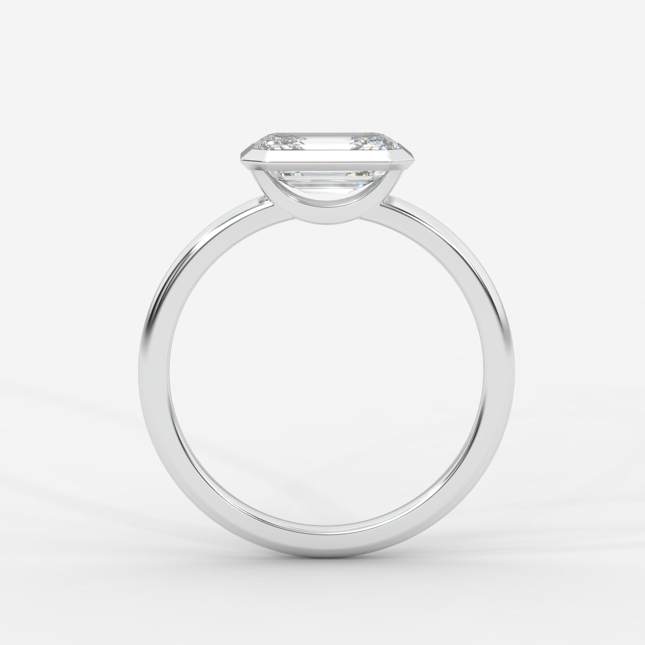 Eden East-West Bezel Solitaire Ring - Emerald
