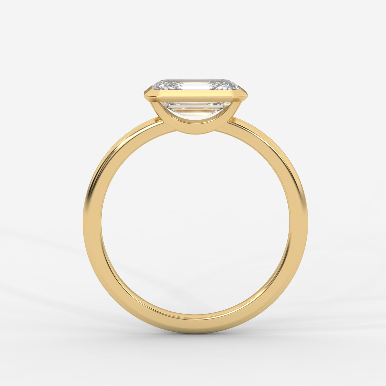 Eden East-West Bezel Solitaire Ring - Emerald