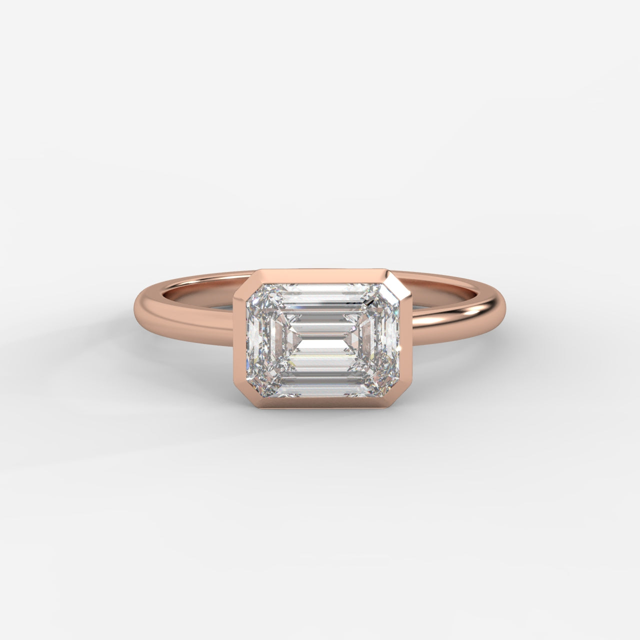 Eden East-West Bezel Solitaire Ring - Emerald