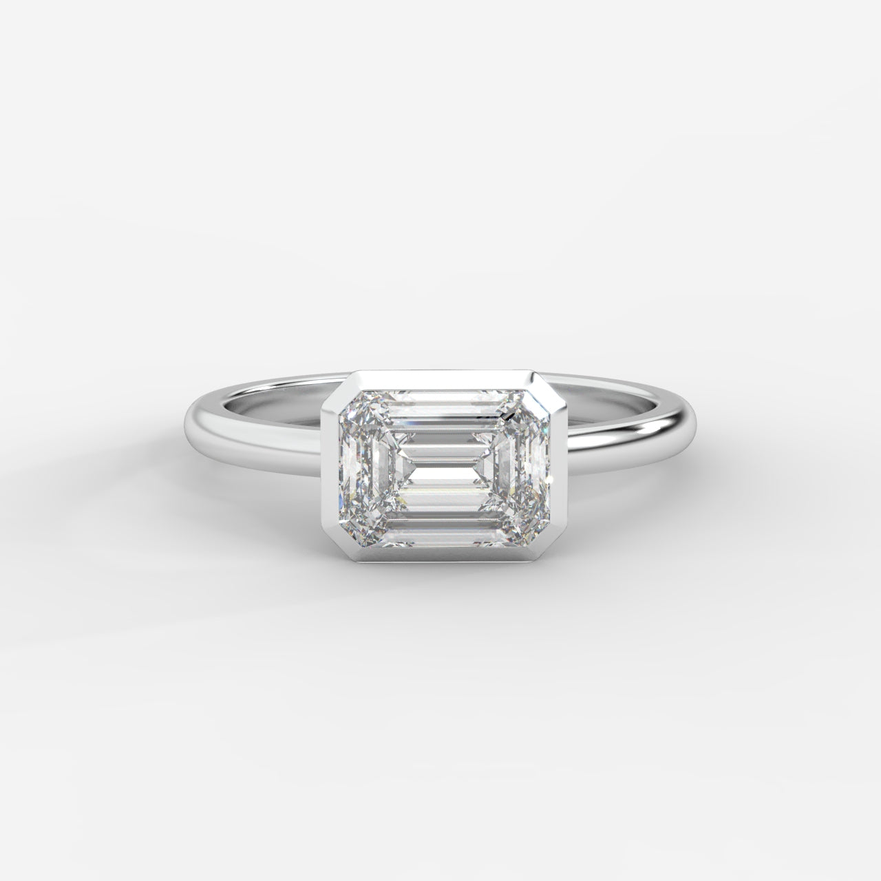 Eden East-West Bezel Solitaire Ring - Emerald