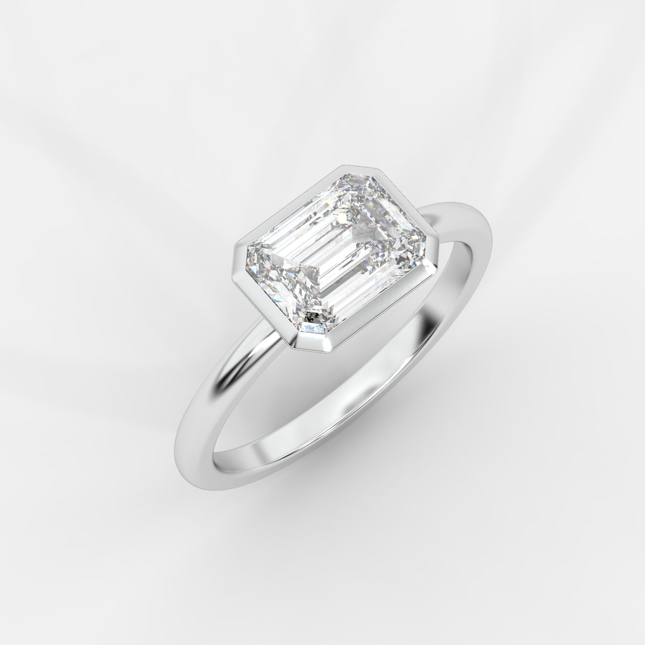 Eden East-West Bezel Solitaire Ring - Emerald